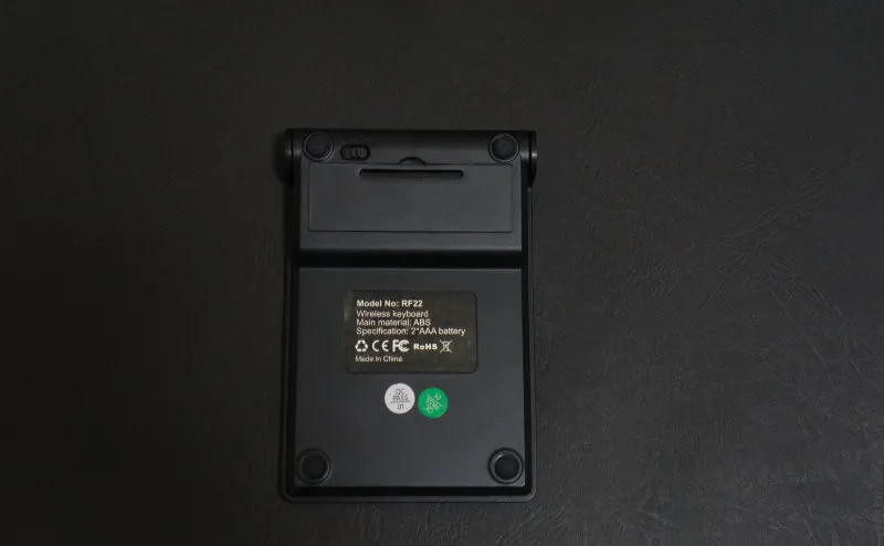 Belis wireless numeric keypad, underside — power switch and battery cover