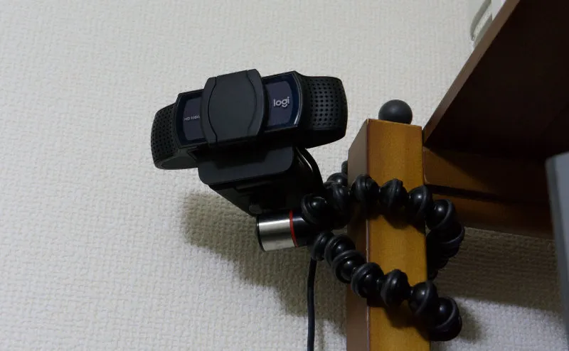JOBY GorillaPod wrapped around a pillar with a webcam attached