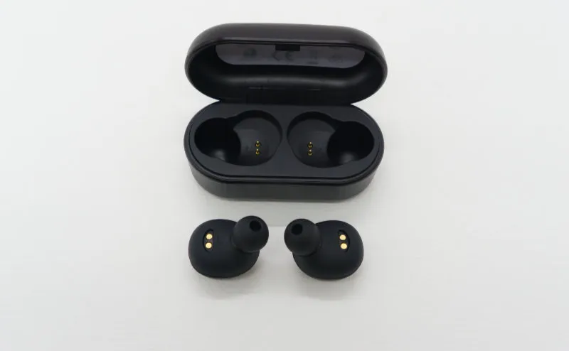 YAMAHA TW-E3A earbuds laid out next to the case